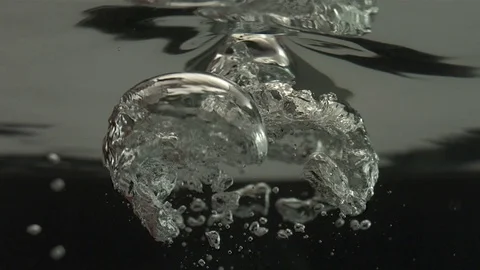 Large Bubbles Rise to the Surface Stock Footage 75912556