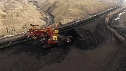 A large bucket wheel excavator digging brown-coal in an open-pit mine Stock Footage 81543492