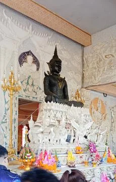 The large Buddha statue is in front of the temple. Stock Photos