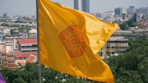Large Buddhist Flag flying at the top of a temple Thailand - Slow motion Stock Footage 58358528