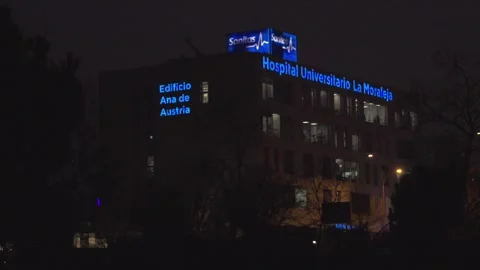 A large building with blue lights on it Stock Footage 328992792