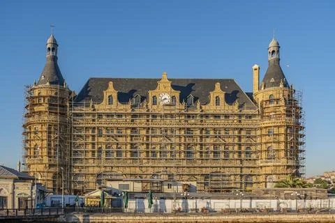 A large building with a clock on the front 스톡 사진