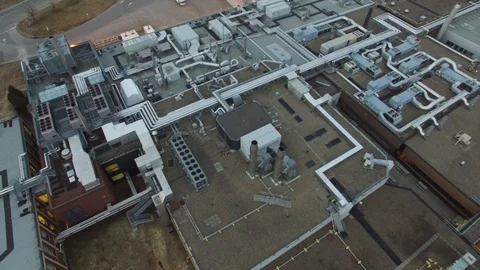 Large building with complex network of aeration system viewed by drone Stock Footage 88418375