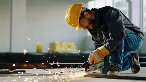 In the large building construction in front of the camera constructor worker Stock Footage 170152996
