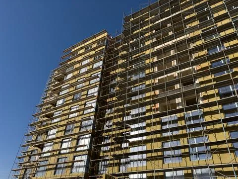 A large building is currently under construction Stock Photos
