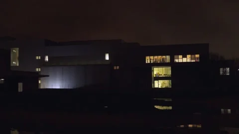 A large building with a dark sky in the background Stock-Footage 328992761