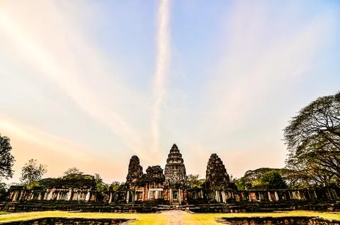 A large building with a lot of trees in front of it Stock Photos