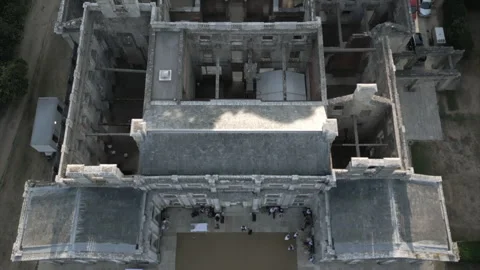 A large building with a lot of windows and a roof Stock Footage 301628943