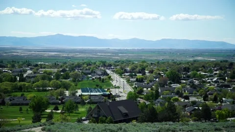 A large building with a mountain in the background Stock Footage 155509637