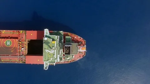 Large bulk carrier ship sailing in open oceanl  - aerial 4k view Stock Footage 111076215