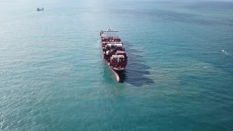Large bulk carrier ship sailing in open oceanl  - aerial 4k view Stock Footage 111177406