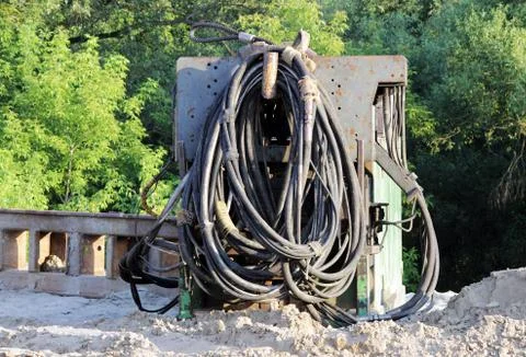 A large bunch of cables at the construction site for the construction of road Stock Photos