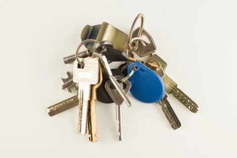 Large bunch of different keys isolated Stock Photos