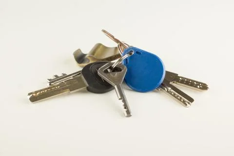 Large bunch of different keys isolated Stock Photos