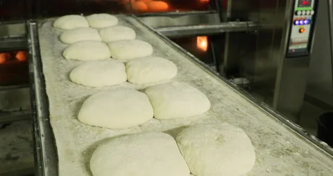 Large Buns Of Bread Ready For Baking Placed On A Deck Oven Loader Or Stock Footage 142112807