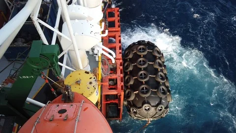Large buoy fender, absorb between tender and sea port Stock Footage 111166693