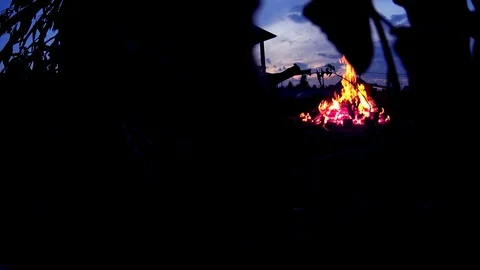 Large burning fire near cottage house in the night Stock Footage 74979565