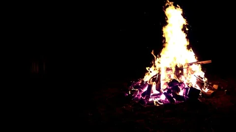 Large burning fire near cottage house in the night Video stock 75035152