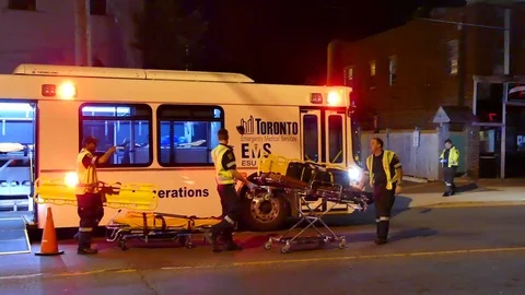 Large bus-converted ambulance with paramedics Video stock 77899599