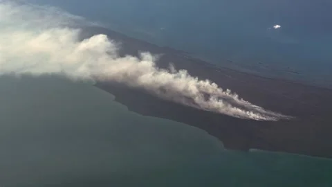 A large bush fire on Little Abaco Island (June 2026), Bahamas near Cedar Harbor  Stock-Footage 336871447
