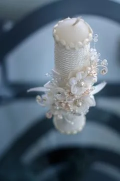 Large candle for the rite of baptism. Stock Photos