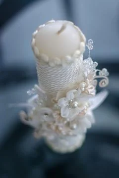 Large candle for the rite of baptism. Stock Photos