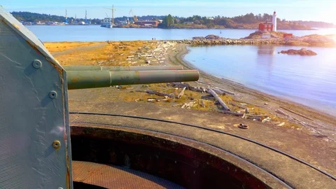 Large Cannon Gun and Lighthouse, Canadian Pacific Naval Fleet, Fort Rodd Hill Stock Footage 89514511