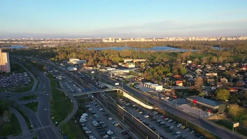Large car junction and pedestrian bridge on the tram tracks in the morning and a Stock Footage 165077898