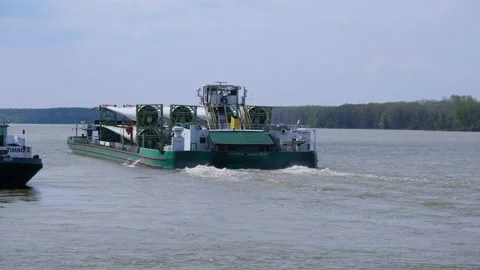 Large Cargo Barge Transporting Wind Turbine Blades on Danube River 스톡 동영상 239285850