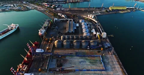 Large Cargo Bay Area On Black Sea Coast Sunset Aerial Descend Burgas Bulgaria Video stock 300488792
