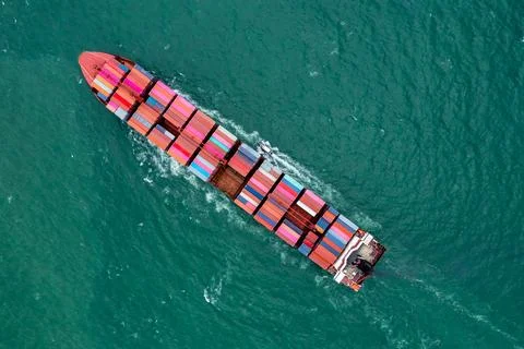 Large Cargo Container Ship Sailing Through Blue Waters In Si Racha Chon Bur.. Stock Photos