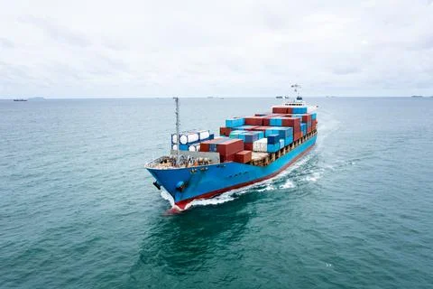 Large Cargo Container Ship Sailing Across Open Sea Near Si Racha Chon Buri .. Stock Photos