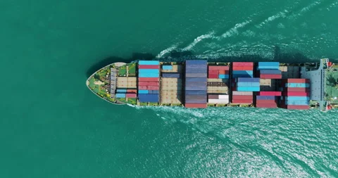 Large Cargo Container Ship Transporting Freight Across Open Ocean Top Down .. Stock Footage 340327445