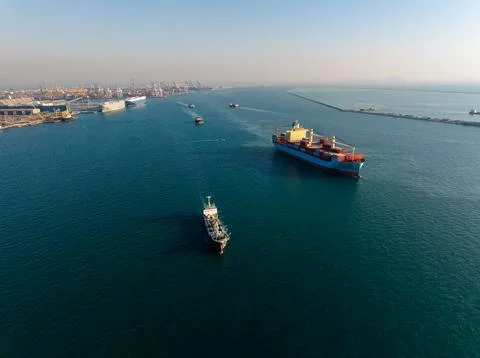 Large Cargo Container Ships Navigating Ocean Waters Near Laem Chabang Port .. Stock Photos