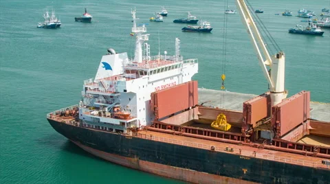 Large Cargo Freighter Ship Crane Offloading Sand Stock Footage 61106021