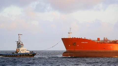 Large cargo ship arriving to port Stock Footage 93041336