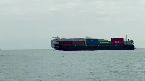 A large cargo ship crossing the sea Stock Footage 257439220