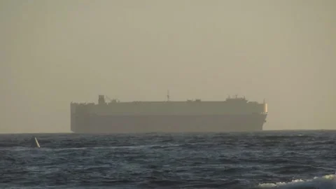 Large Cargo Ship in the Distance Video stock 254366438