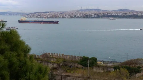 A large cargo ship moves along the Bosporus from the Black Sea to the Marble. Stock Footage 88103289