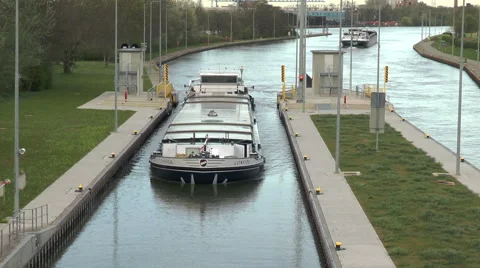 Large cargo ship is navigating in a sluice Stock Footage 49205608