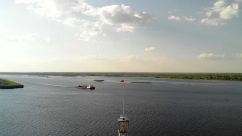 Large cargo ship at river - Side Aerial view Video stock 108984188