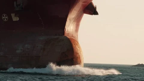 Large cargo ship sailing on the sea. Bow of the ship, Bulb close-up. Logistics 스톡 동영상 267670702