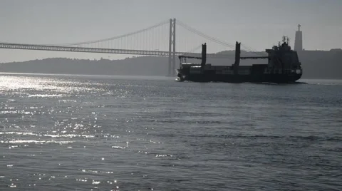 Large cargo ship sailing on Tagus River. Video stock 48977876