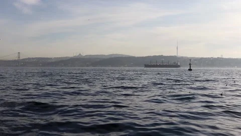 A large cargo ship sails through the Bosphorus. Stock Footage 150211834