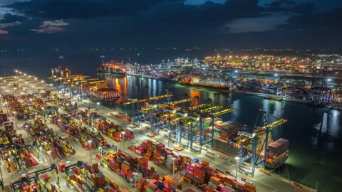 Large cargo ships parked at a large export warehouse in an industrial area. Stock Footage 291374900