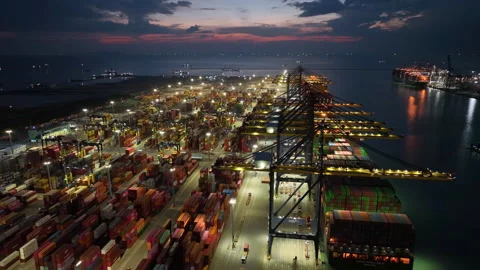 Large cargo ships parked at a large export warehouse in an industrial area. Stock Footage 292599799