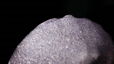 Large cascade of bubbles against a black background Stock Footage 46437197