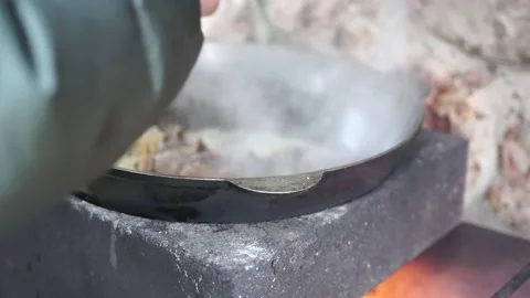 Large cauldron with freshly cooked rice.... | Stock Video | Pond5