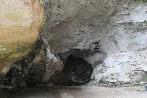 Large cave inside the mountain used by primitive prehistoric men as a home an Stock Photos