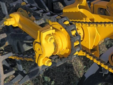 Large chain drive on a seed separator machine. large chain drive on a seed... Stock Photos